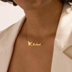 Personalized stainless steel butterfly name necklace with custom name pendant, adjustable 15.7–17.7 inches chain, gold finish worn on model.