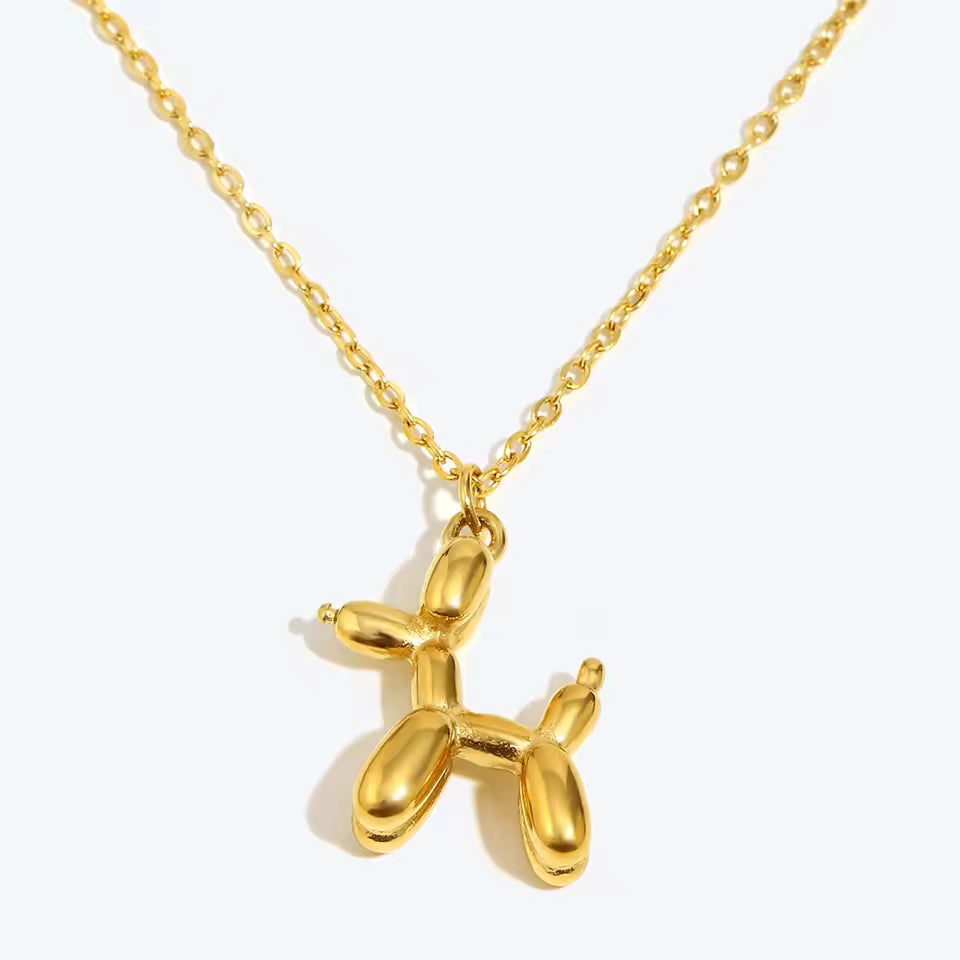 18K gold plated stainless steel balloon dog pendant necklace with cute animal design on a link chain, unisex jewelry on white background