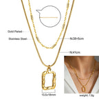 18K gold plated stainless steel engraved geometric pendant necklace with pearl accent, layered link chains, trendy women’s jewelry on white background