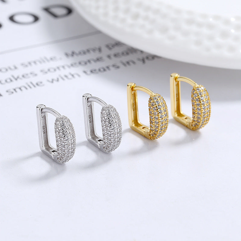 Gold plated 925 sterling silver hoop earrings with full pavé zircon sparkle