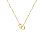 Stainless steel 18K gold PVD plated interlocking heart pendant necklace with minimalist geometric design on fine chain.