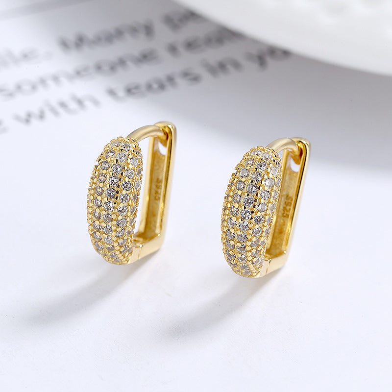 Gold plated 925 sterling silver hoop earrings with full pavé zircon sparkle