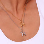 18K gold plated stainless steel balloon dog pendant necklace with cute animal design on a link chain, unisex jewelry on white background