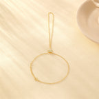 Gold plated 925 sterling silver hand chain bracelet with clover zircon detail and chain link design