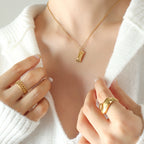 18K gold plated stainless steel pearl pendant necklace with minimalist geometric design, bead chain, adjustable unisex jewelry on white background