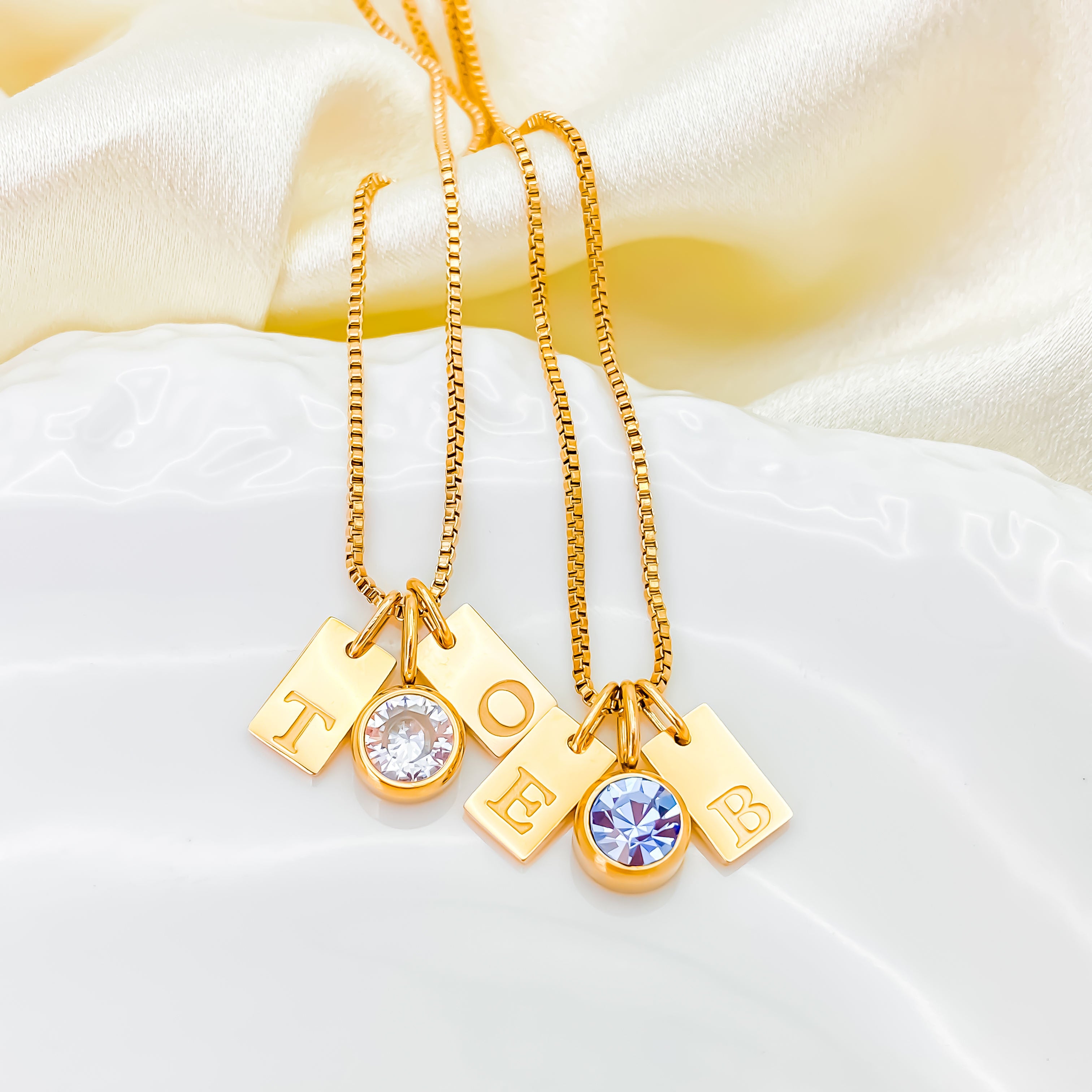 14K gold PVD plated stainless steel personalized necklace with square letter charms and one birthstone pendant, custom initial and birth month design.