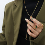 18K gold plated stainless steel knotted pendant necklace with long adjustable chain, geometric trendy women’s jewelry on white background