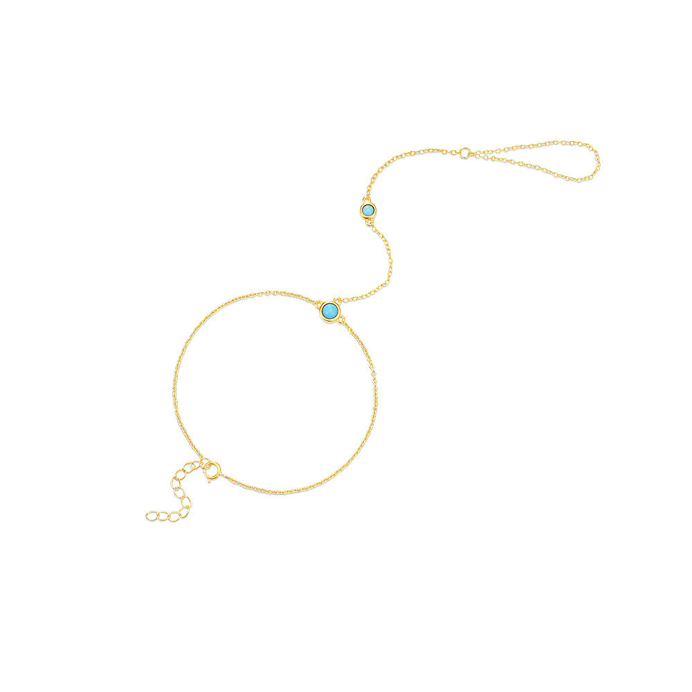 Gold plated 925 sterling silver hand chain bracelet with round turquoise stone and finger loop design
