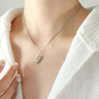 18K gold plated stainless steel pearl pendant necklace with minimalist geometric design, bead chain, adjustable unisex jewelry on white background