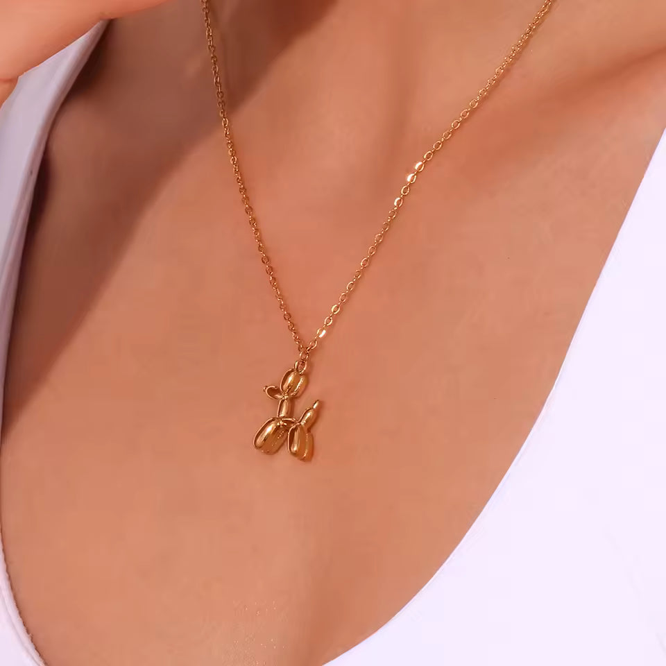 18K gold plated stainless steel balloon dog pendant necklace with cute animal design on a link chain, unisex jewelry on white background