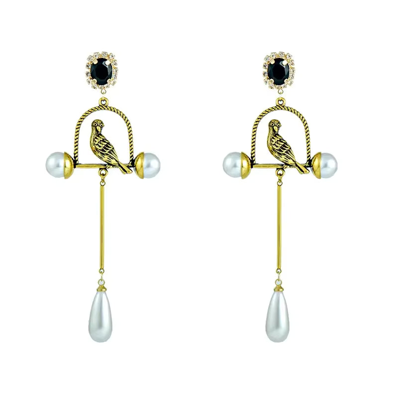 Retro palace-style long pearl drop earrings with vintage statement design for women