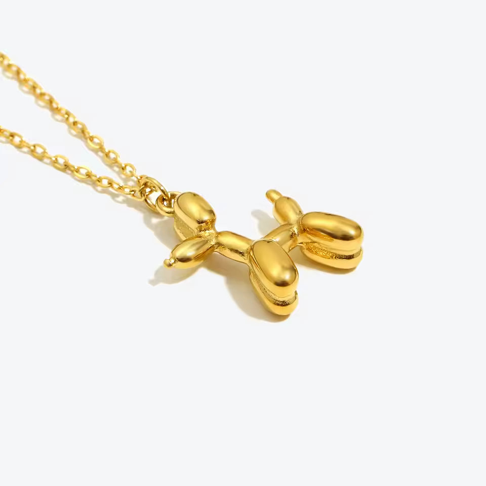 18K gold plated stainless steel balloon dog pendant necklace with cute animal design on a link chain, unisex jewelry on white background