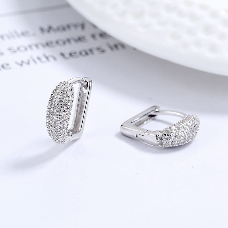 Gold plated 925 sterling silver hoop earrings with full pavé zircon sparkle