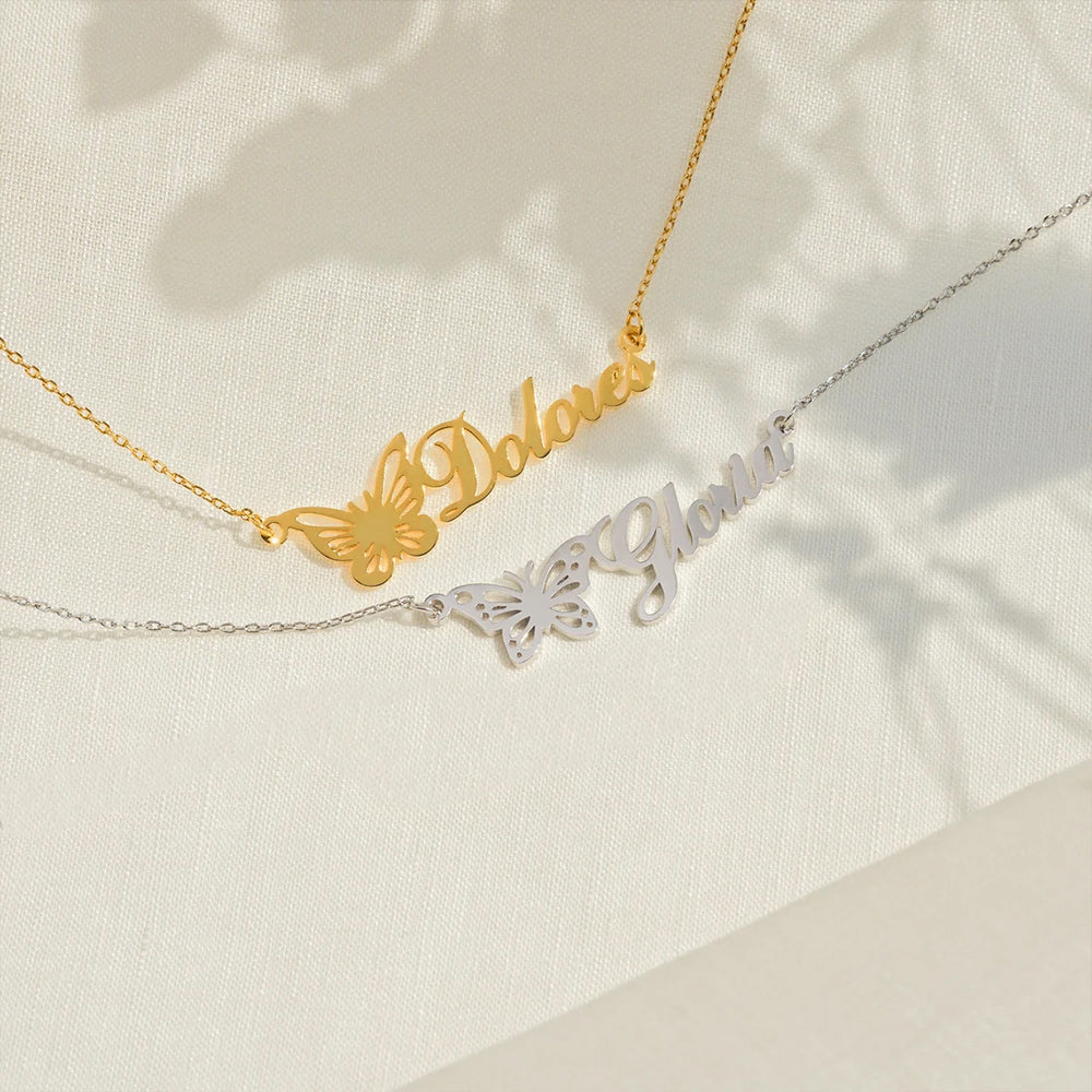 Personalized stainless steel butterfly name necklace with custom name pendant, adjustable 15.7–17.7 inches chain, gold finish worn on model.