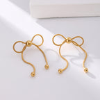 18K gold PVD plated stainless steel bow knot drop earrings with delicate chain design and polished bead accents for women