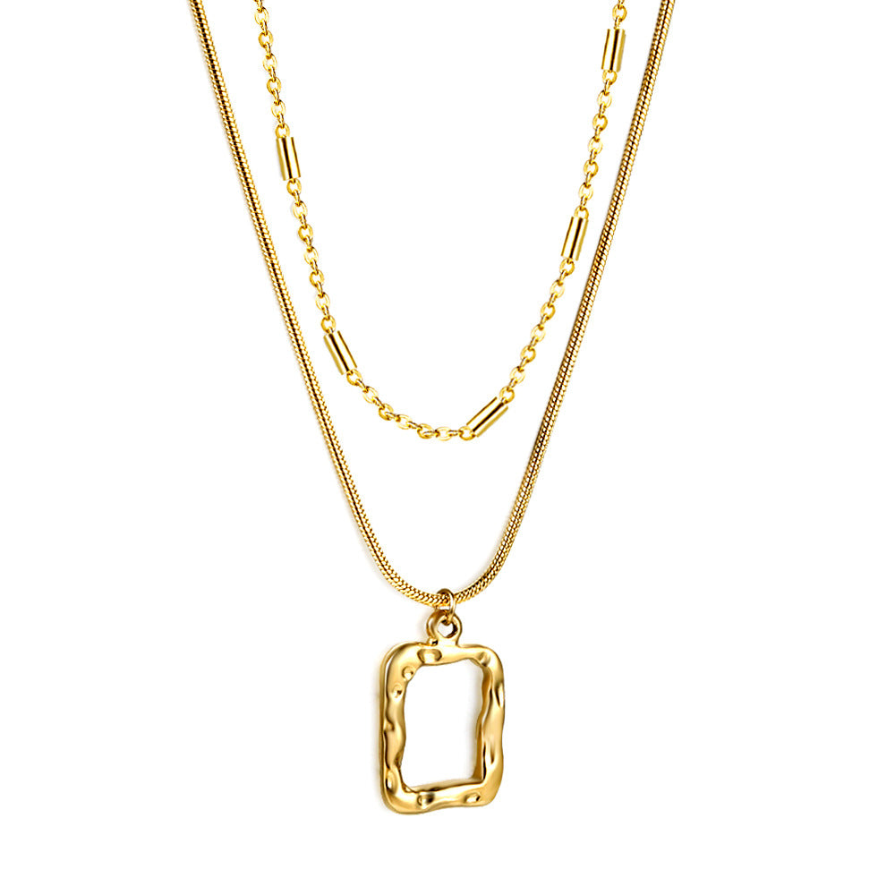 18K gold plated stainless steel engraved geometric pendant necklace with pearl accent, layered link chains, trendy women’s jewelry on white background