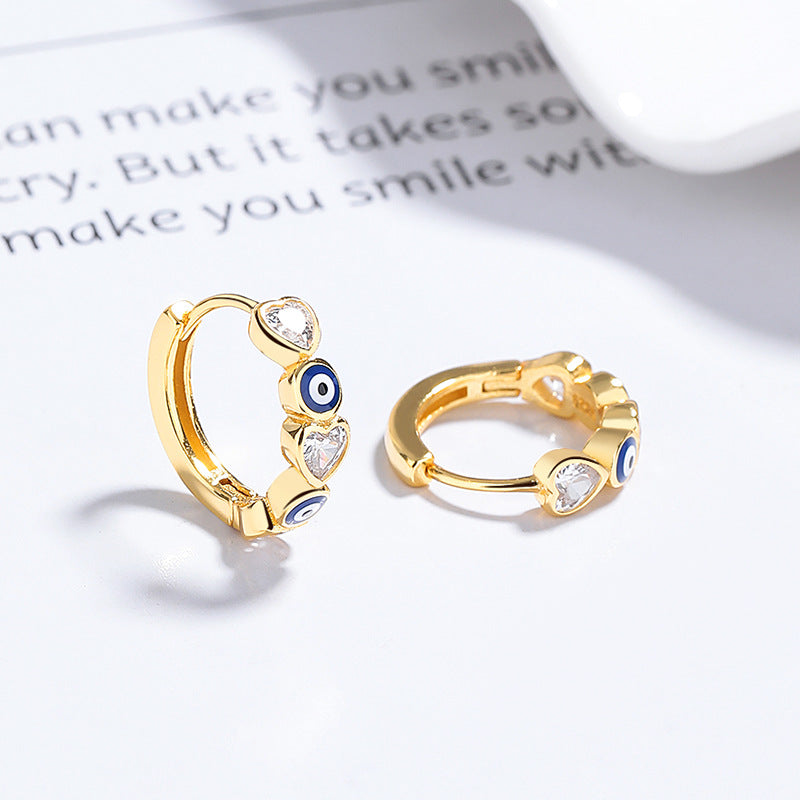 Gold plated 925 sterling silver evil eye hoop earrings with blue and red zircon heart detail