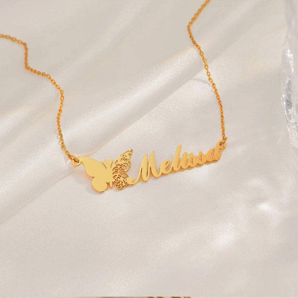 Personalized stainless steel butterfly name necklace with custom name pendant, adjustable 15.7–17.7 inches chain, gold finish worn on model.