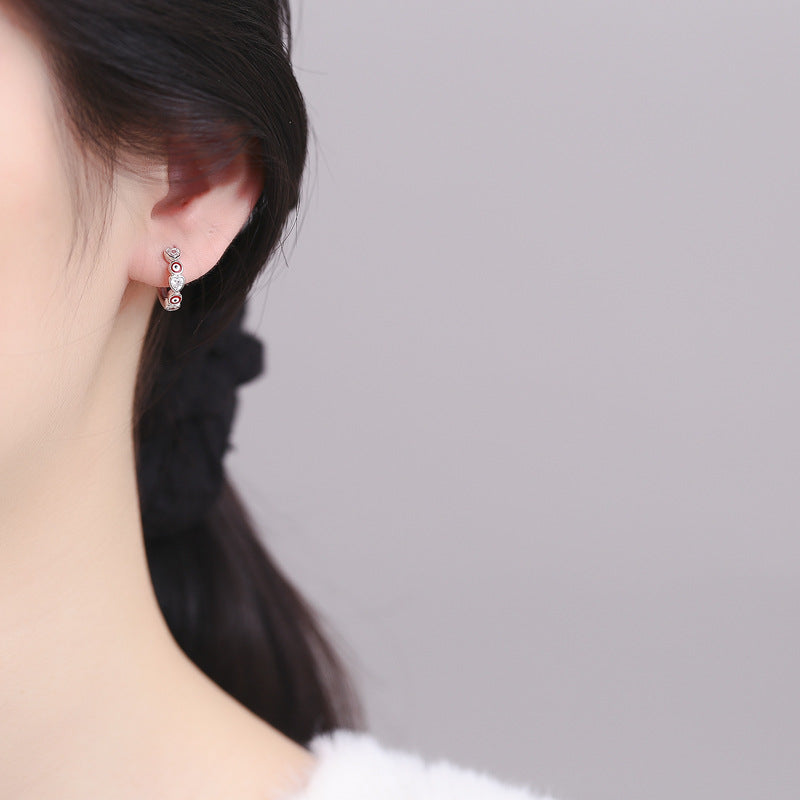 Gold plated 925 sterling silver evil eye hoop earrings with blue and red zircon heart detail