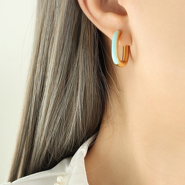 Gold PVD plated stainless steel U-shaped earrings with glossy enamel color accent, modern geometric design for women.