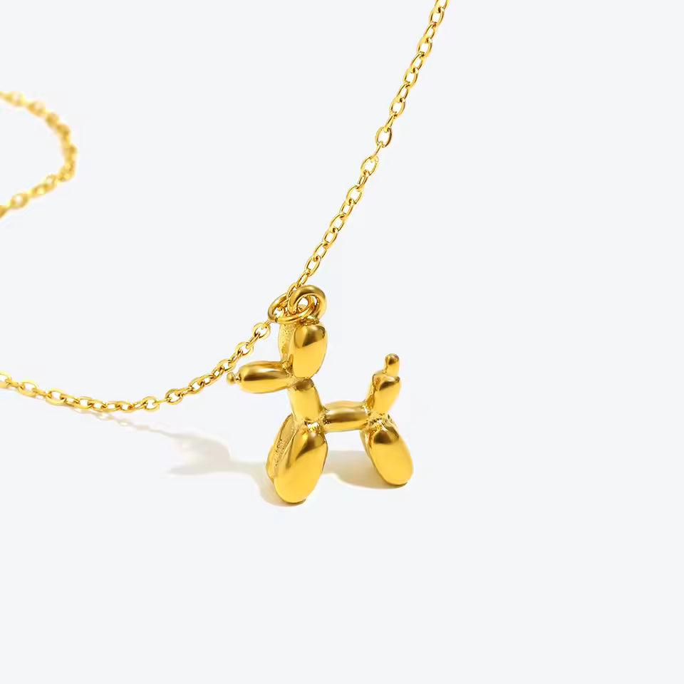18K gold plated stainless steel balloon dog pendant necklace with cute animal design on a link chain, unisex jewelry on white background