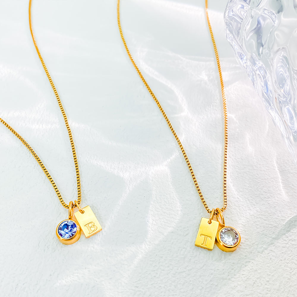 14K gold PVD plated stainless steel personalized necklace with square letter charms and one birthstone pendant, custom initial and birth month design.