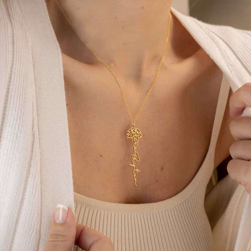 Personalized birth month flower necklace in stainless steel with custom name pendant, adjustable 15.7–17.7 inches chain, gold finish shown.