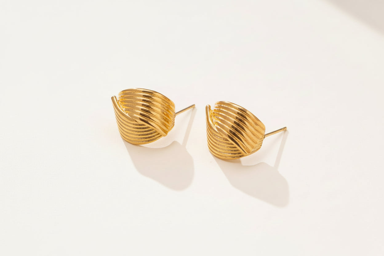 18K gold PVD plated stainless steel geometric stud earrings with layered design and polished finish for women.