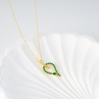 snake pendant necklace, sterling silver necklace, gold plated snake jewelry, green stone necklace, women’s party necklace, wedding jewelry for women, minimalist snake pendant, fine jewelry necklace, unique snake design necklace