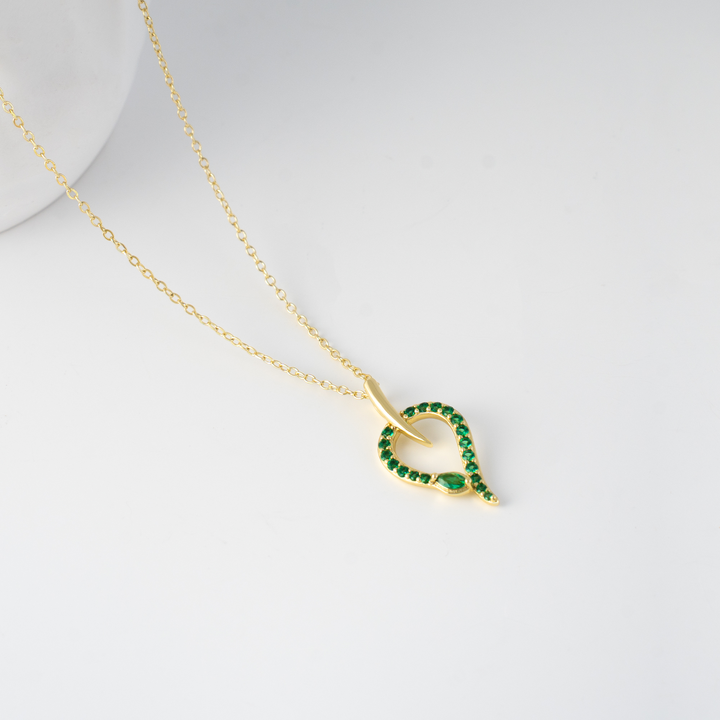 snake pendant necklace, sterling silver necklace, gold plated snake jewelry, green stone necklace, women’s party necklace, wedding jewelry for women, minimalist snake pendant, fine jewelry necklace, unique snake design necklace