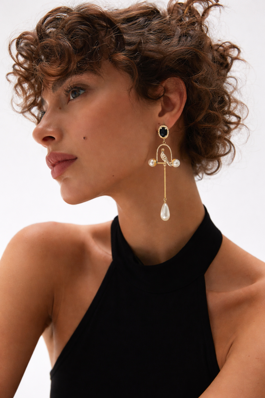 Retro palace-style long pearl drop earrings with vintage statement design for women