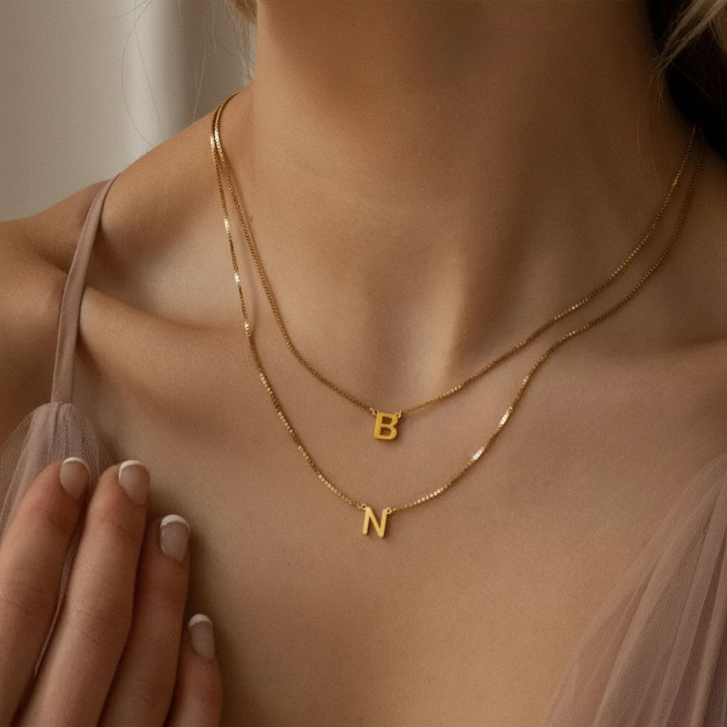 Gold plated stainless steel letter pendant necklace with 42+8 cm chain, minimalist initial jewelry for women.