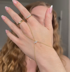 Gold plated 925 sterling silver hand chain bracelet with clover zircon detail and chain link design