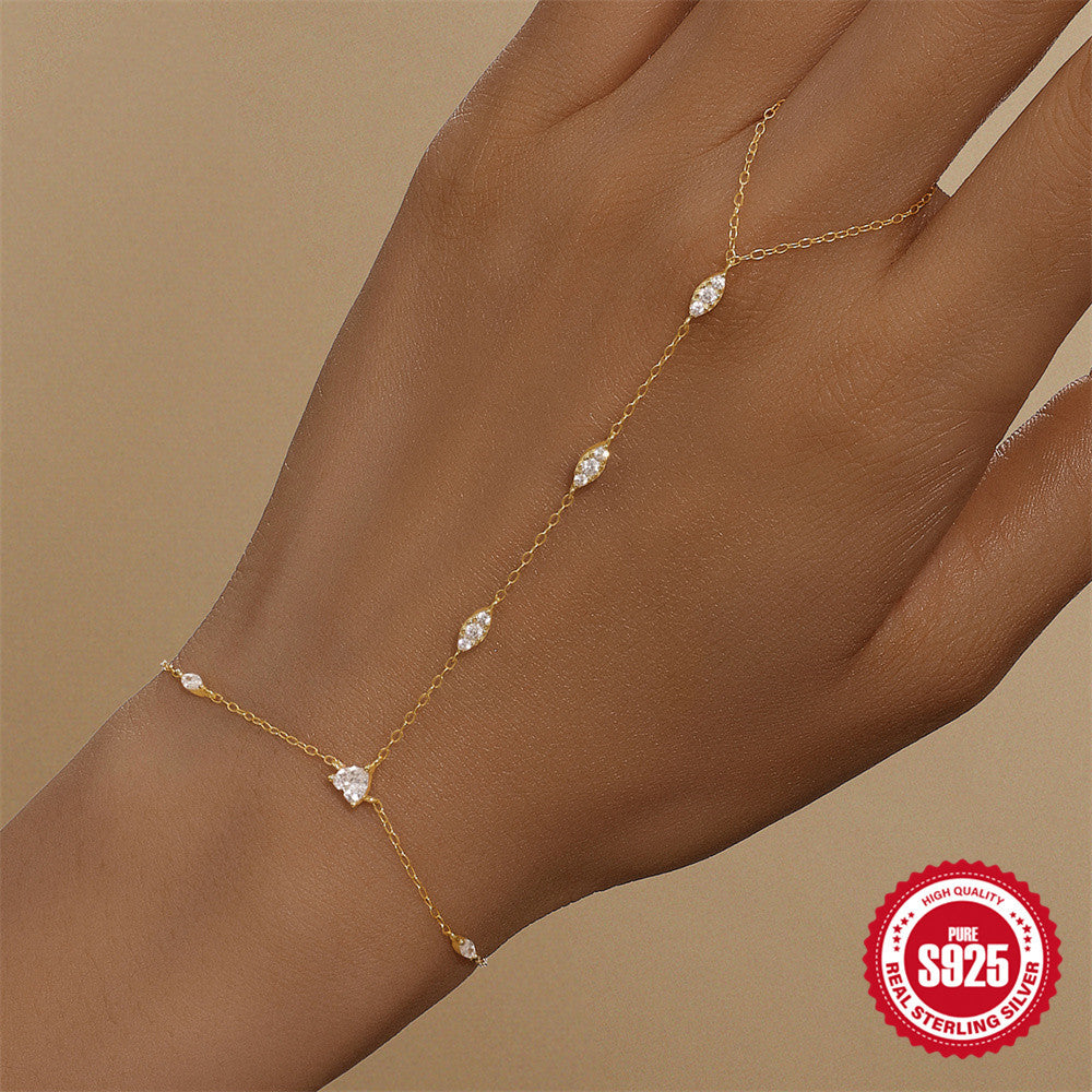 Gold plated 925 sterling silver hand chain bracelet with marquise evil eye detail and AAAAA cubic zirconia