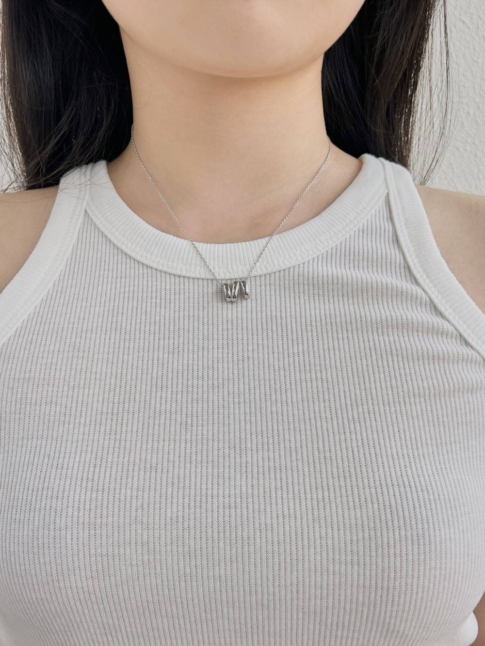 18K gold plated stainless steel geometric hollow pendant necklace with bead chain, adjustable unisex jewelry on white background