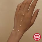 Gold plated 925 sterling silver hand chain bracelet with marquise evil eye detail and AAAAA cubic zirconia
