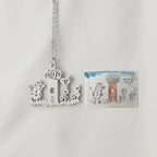 Personalized kids drawing necklace made from children’s artwork in stainless steel