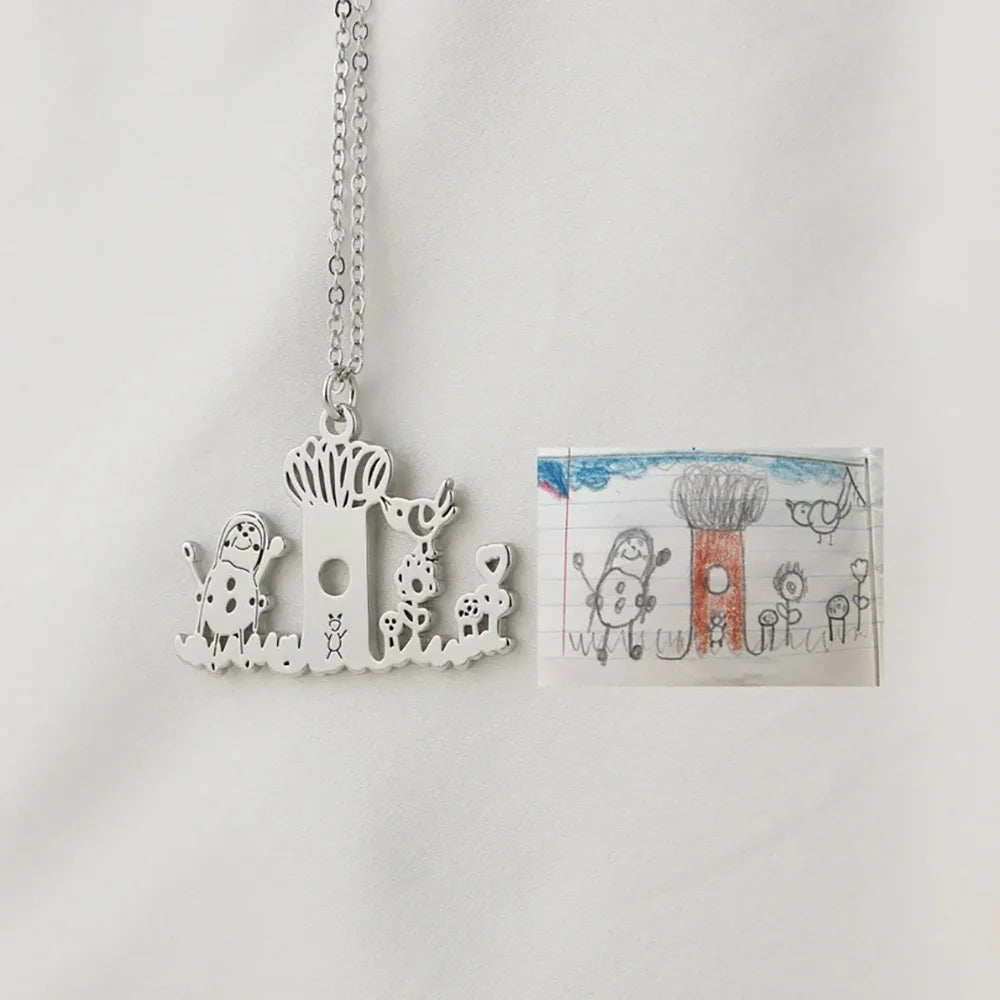 Personalized kids drawing necklace made from children’s artwork in stainless steel