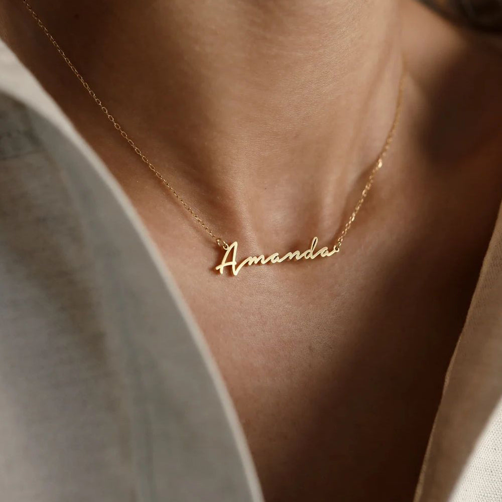 Custom stainless steel initial name necklace with 14K gold or silver plating on a link chain, personalized letter choker for women.