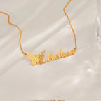 Personalized stainless steel butterfly name necklace with custom name pendant, adjustable 15.7–17.7 inches chain, gold finish worn on model.