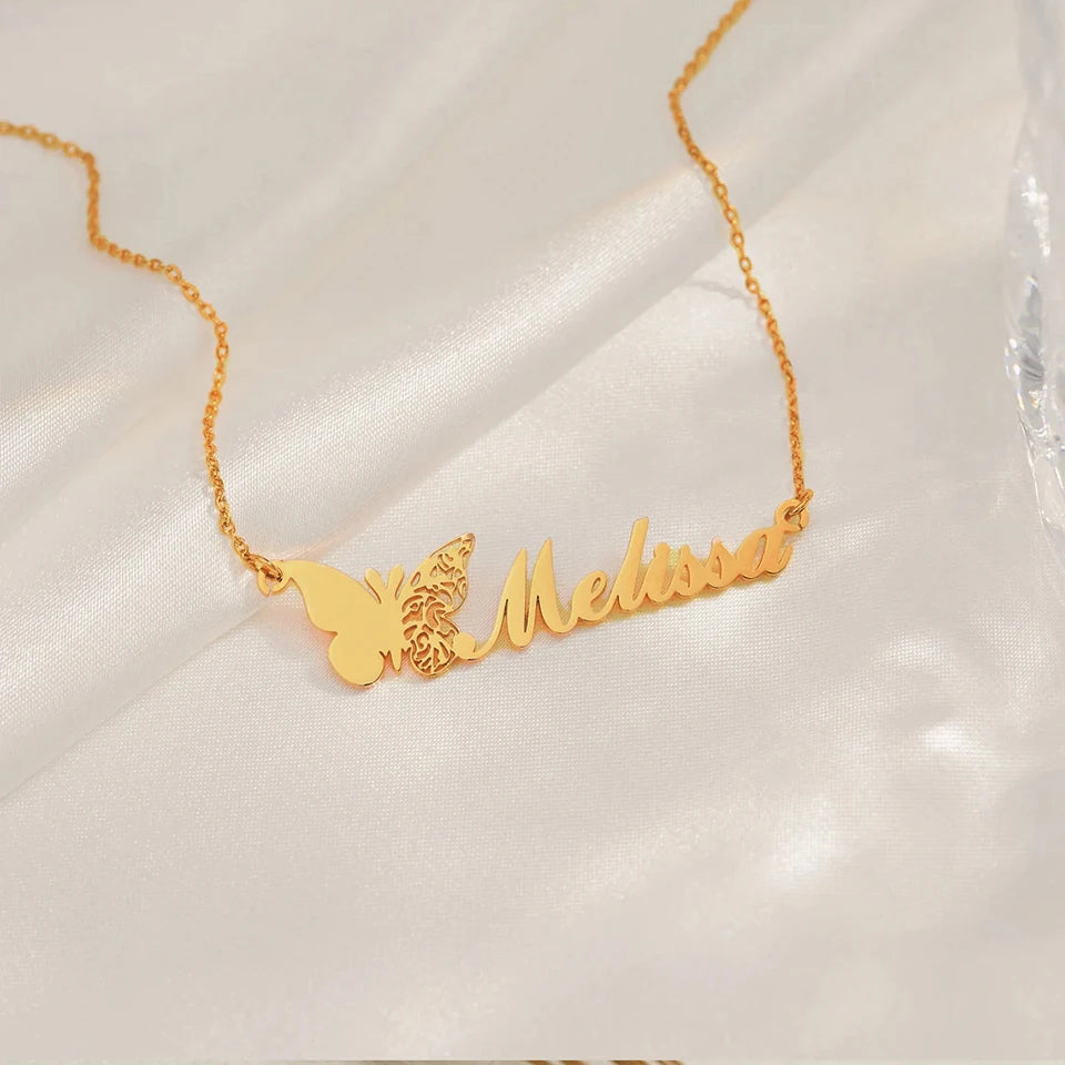 Personalized stainless steel butterfly name necklace with custom name pendant, adjustable 15.7–17.7 inches chain, gold finish worn on model.
