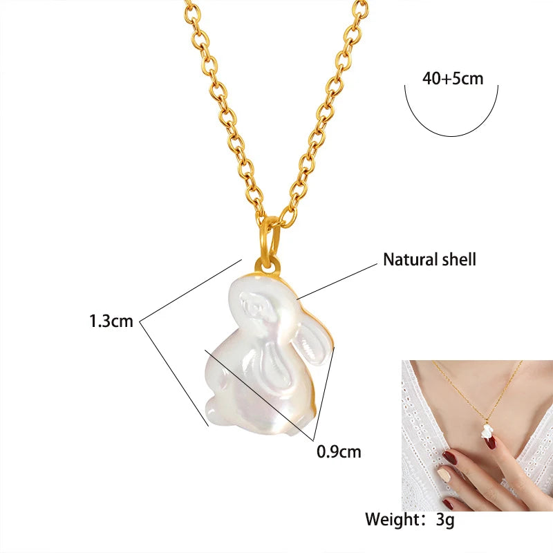 18K gold plated stainless steel rabbit shell pendant necklace with natural shell charm and adjustable link chain on white background