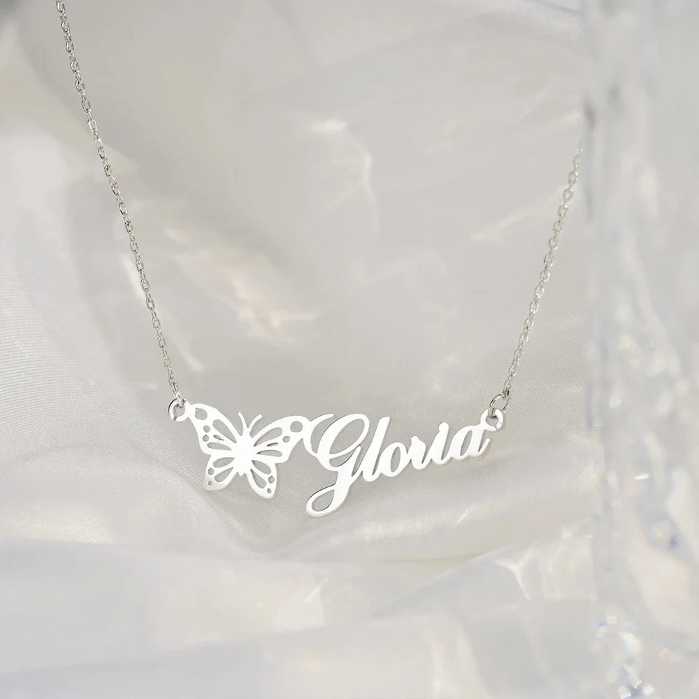 Personalized stainless steel butterfly name necklace with custom name pendant, adjustable 15.7–17.7 inches chain, gold finish worn on model.